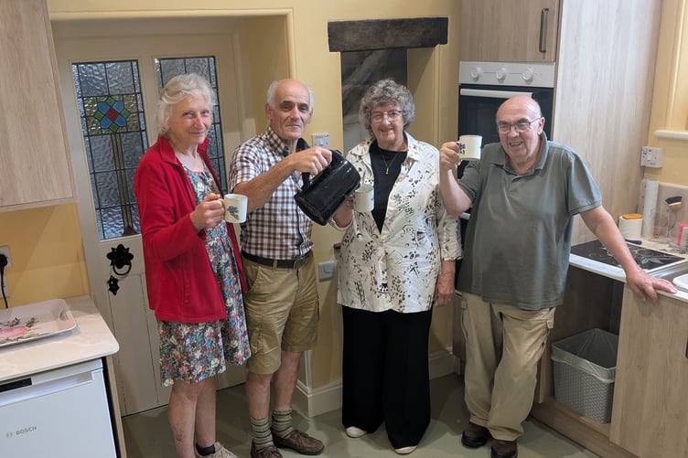 Pictured are committee members in the newly refurbished kitchen at Milton Abbot Village Hall, from left Sonia Watson, chairman Jonathan Watson, Chris Harrap and Andy Harrap.