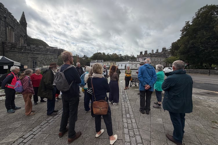A group of visitors join in a guided walking tour of Tavistock during the town's Heritage Open Days.