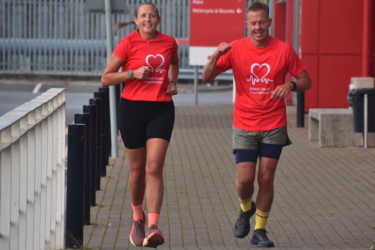 Royal Mail managers Leesa Grainger and Paul Davies have raised funds for the British Heart Foundation by running 100km in a day.