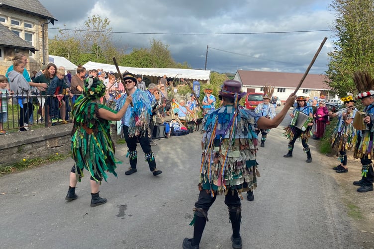 Dartmoor Border Morris jingle and bash sticks at Bere Apple Fest.