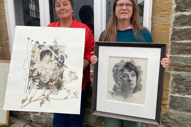 Left to right Jo Waldron and Tanya Snelsdon with the pictures to be exhibited at Tavistock's Printworks.