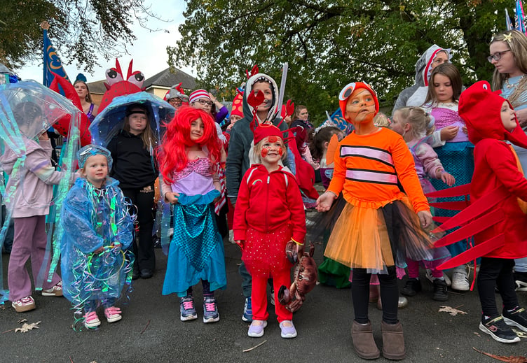 Okehampton Brownies and Guides were sea creatures in the carnival. Okehampton Carnival 2026.