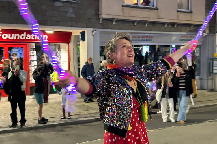The bubble lady dispensing bubbles just before the procession.