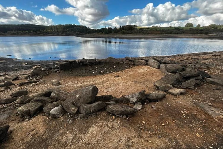 Fernworthy Reservoir's Bronze Age hut circle is usually submerged, but low water levels have revealed it