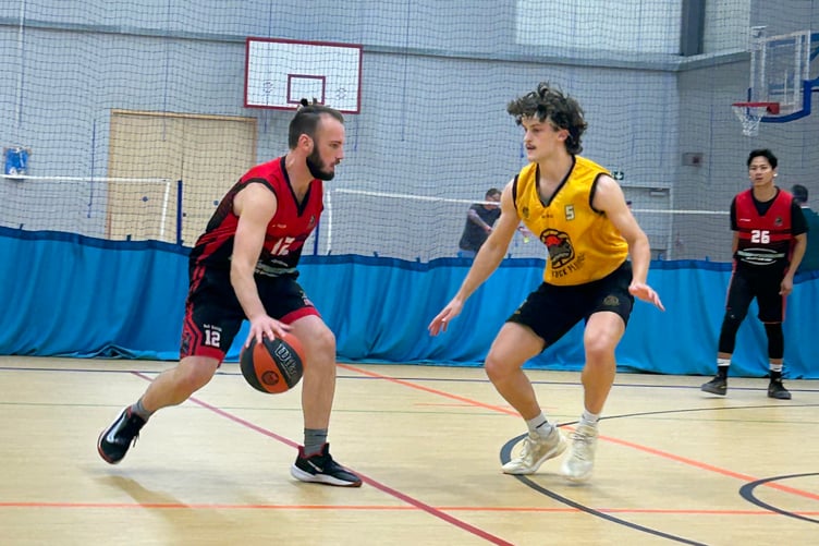 A Tavistock Titans player finding a way through the Kitto Platypus defence.