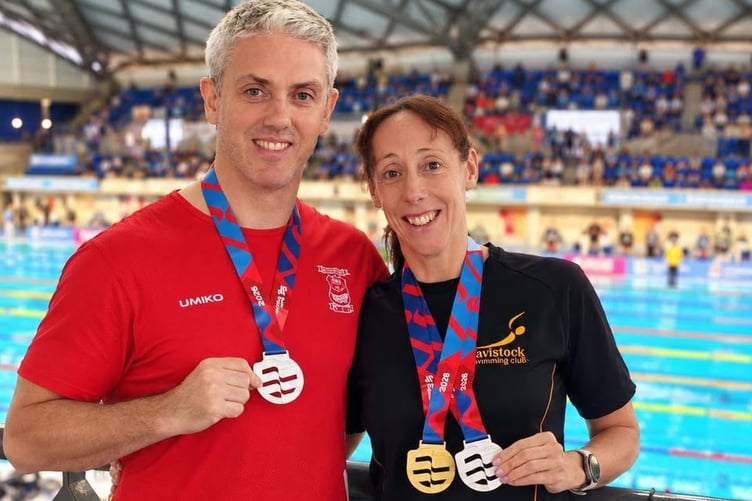 Golden couple, James and Sam Lake, of Tavistock Swimming Club, celebrate medals and a world record at the Swim England Masters National Championships.
