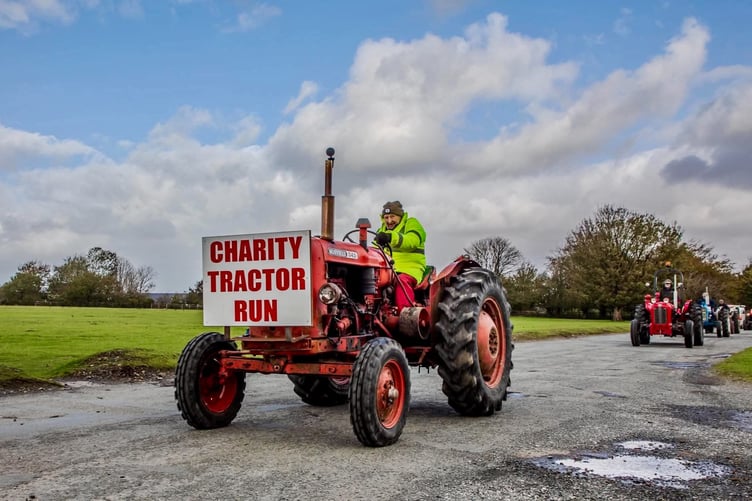Farmer Fran Mudge leads his trail of tractors across Yelverton Airfield to raise money in memory of his late nephew.