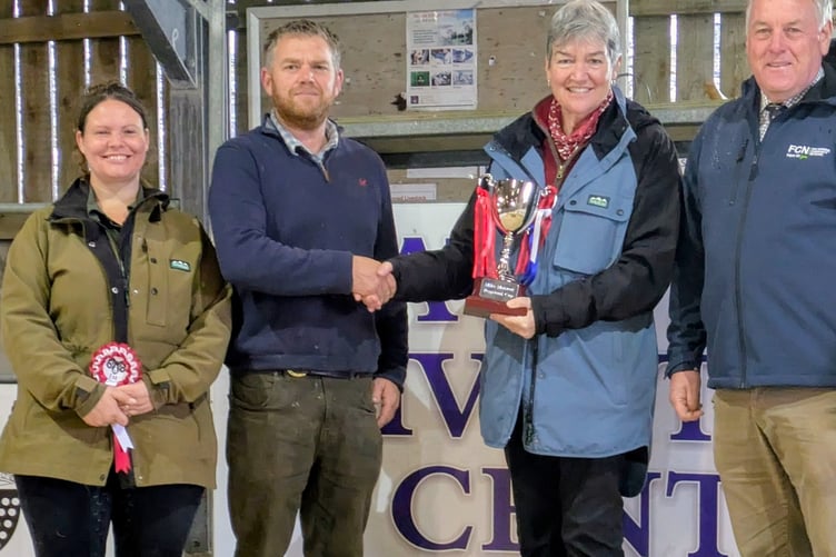 The Vanstone family receive the inaugural Mike Malseed Perpetual Cup at Tavistock Livestock Market.